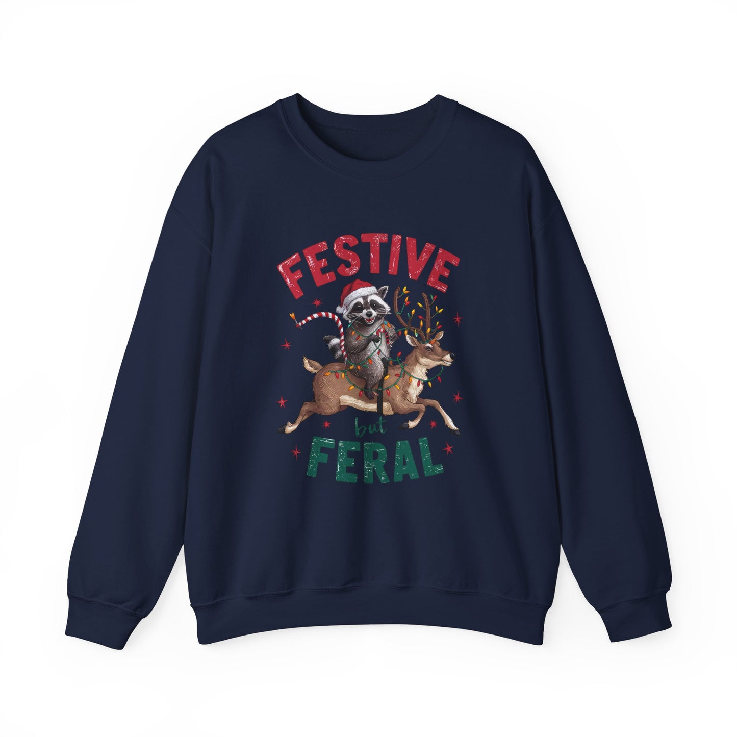 Front view of a navy blue sweatshirt featuring a festive illustration of a raccoon (trash panda) holding Christmas lights and the text "Festive but Feral." Part of the Vivid Divergence Sensory Friendly Unisex Sweater Jumper Range.
