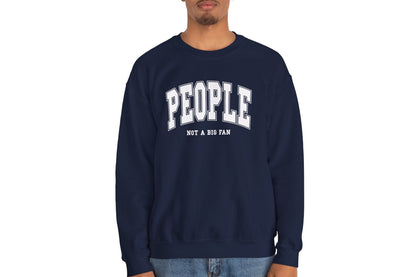 Model wearing a navy blue sweater jumper with the text "People. Not a Big Fan" in bold white lettering. Part of the Vivid Divergence Sensory Friendly Unisex Sweater Jumper Range.