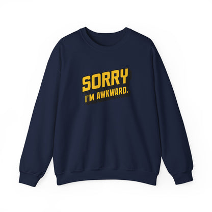 Front view of a navy blue sweater jumper with the text "Sorry, I'm Awkward." in bold yellow lettering. Part of the Vivid Divergence Sensory Friendly Unisex Sweater Jumper Range.
