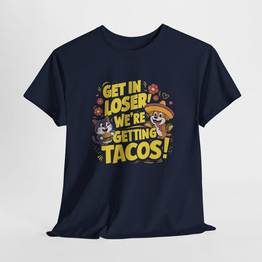 Hanging front view of a navy blue T-shirt with colorful text and illustrations of cute animals in a car that reads "Get In Loser, We're Getting Tacos!" Part of the Vivid Divergence Sensory Friendly Unisex Tees Range.