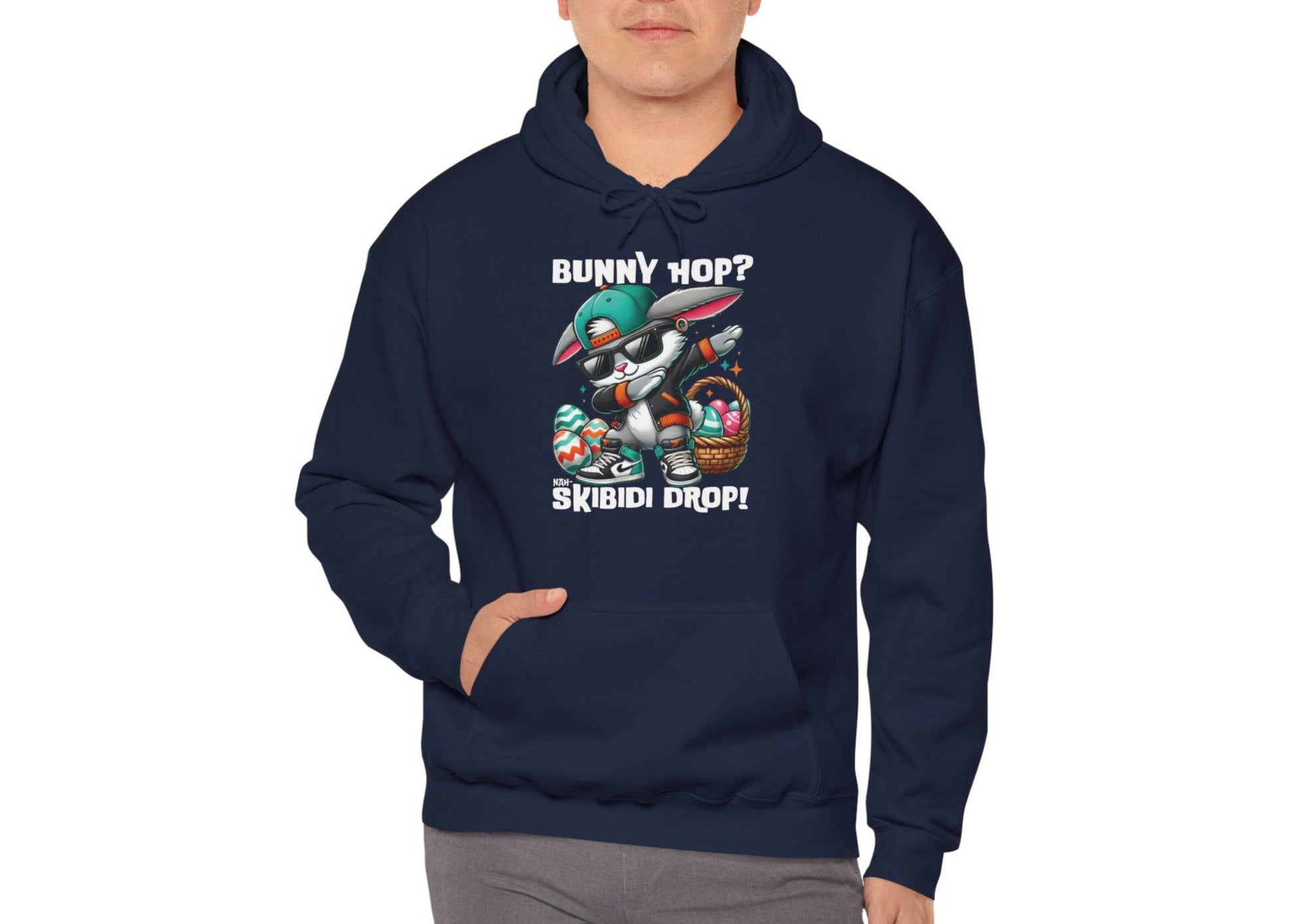 Man modeling navy hoodie with Skibidi Drop text and dabbing bunny. Part of the Vivid Divergence Sensory Friendly Unisex Hoodies Range.
