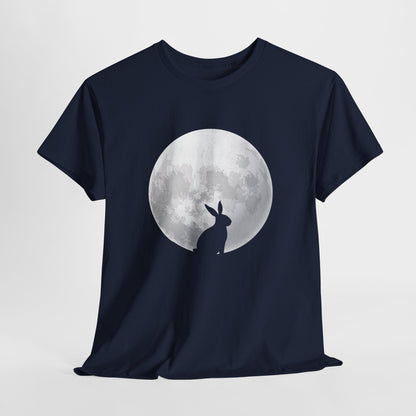 Navy blue T-shirt hanging, showcasing a mysterious rabbit silhouette against a luminous full moon, an elegant and cosmic Easter design. Hop into the season in style and shop Easter shirts online today!