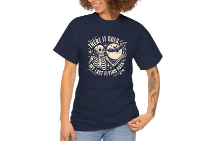 Model wearing a navy T-shirt with the text "There It Goes, My Last Flying F*ck" and a graphic of a flying bird carrying a banner. Part of the Vivid Divergence Sensory Friendly Unisex Tees Range.