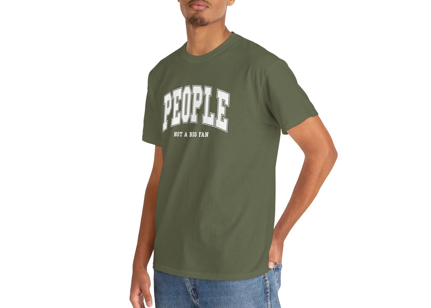 Model wearing an olive green T-shirt with "People, Not a Big Fan" in bold white text. Part of the Vivid Divergence Sensory Friendly Unisex Tees Range.