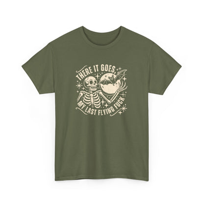 Front view of an olive green T-shirt with the text "There It Goes, My Last Flying F*ck" and a graphic of a flying bird carrying a banner. Part of the Vivid Divergence Sensory Friendly Unisex Tees Range.