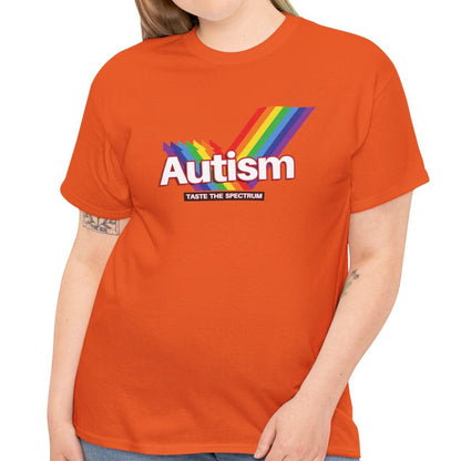 Side view of an orange T-shirt worn by a person, featuring the phrase "Autism" in a Skittles-inspired design and a rainbow graphic. Part of the Vivid Divergence Sensory Friendly Unisex Tees Range.