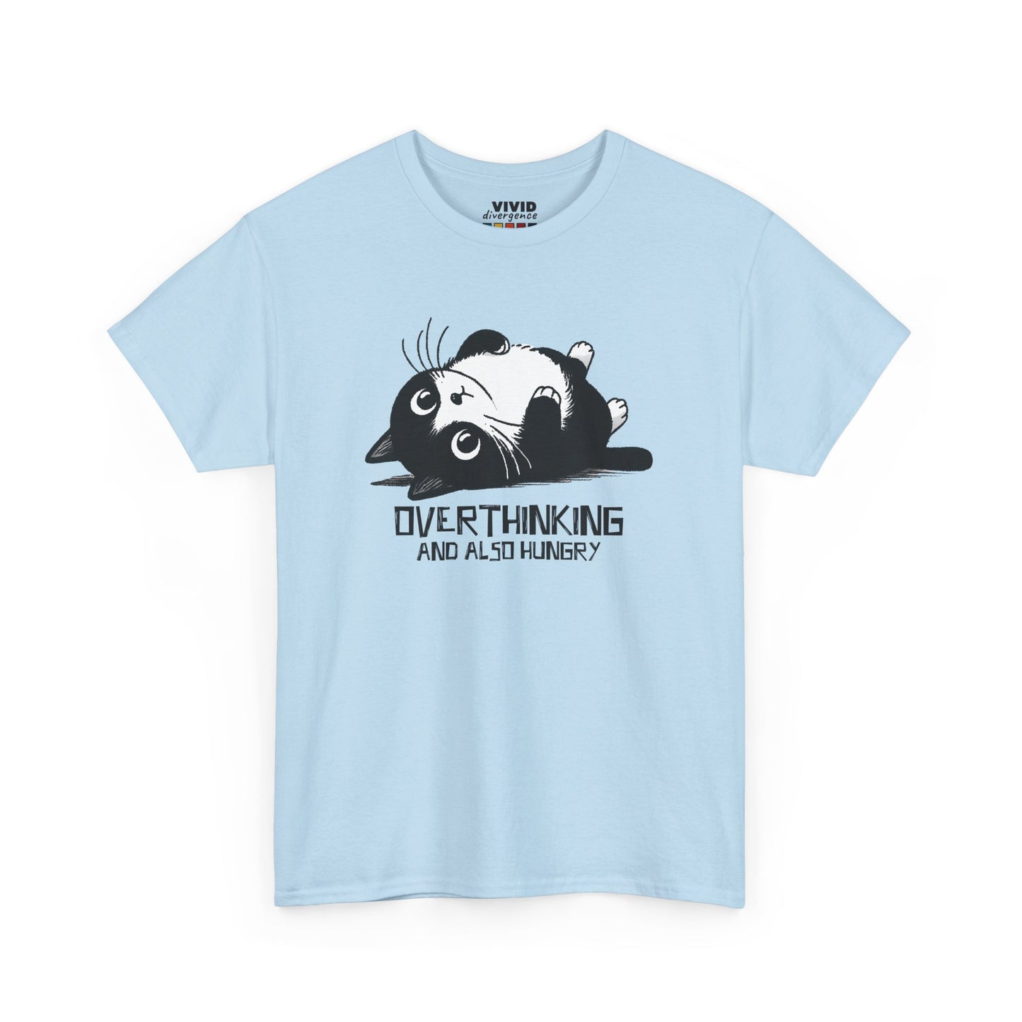 Front view of light blue T-shirt featuring black line art of a wide-eyed cat surrounded by scribbles, with the phrase "Overthinking and also hungry." A whole vibe. Part of the Vivid Divergence Memewear Collection!