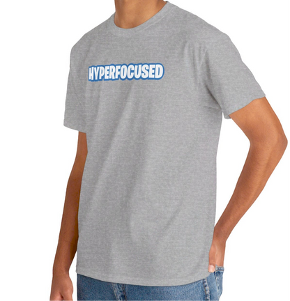 A person wearing a black T-shirt with the text "Hyperfocused" in a Fortnite-style design. Part of the Vivid Divergence Sensory Friendly Unisex Tees Range.