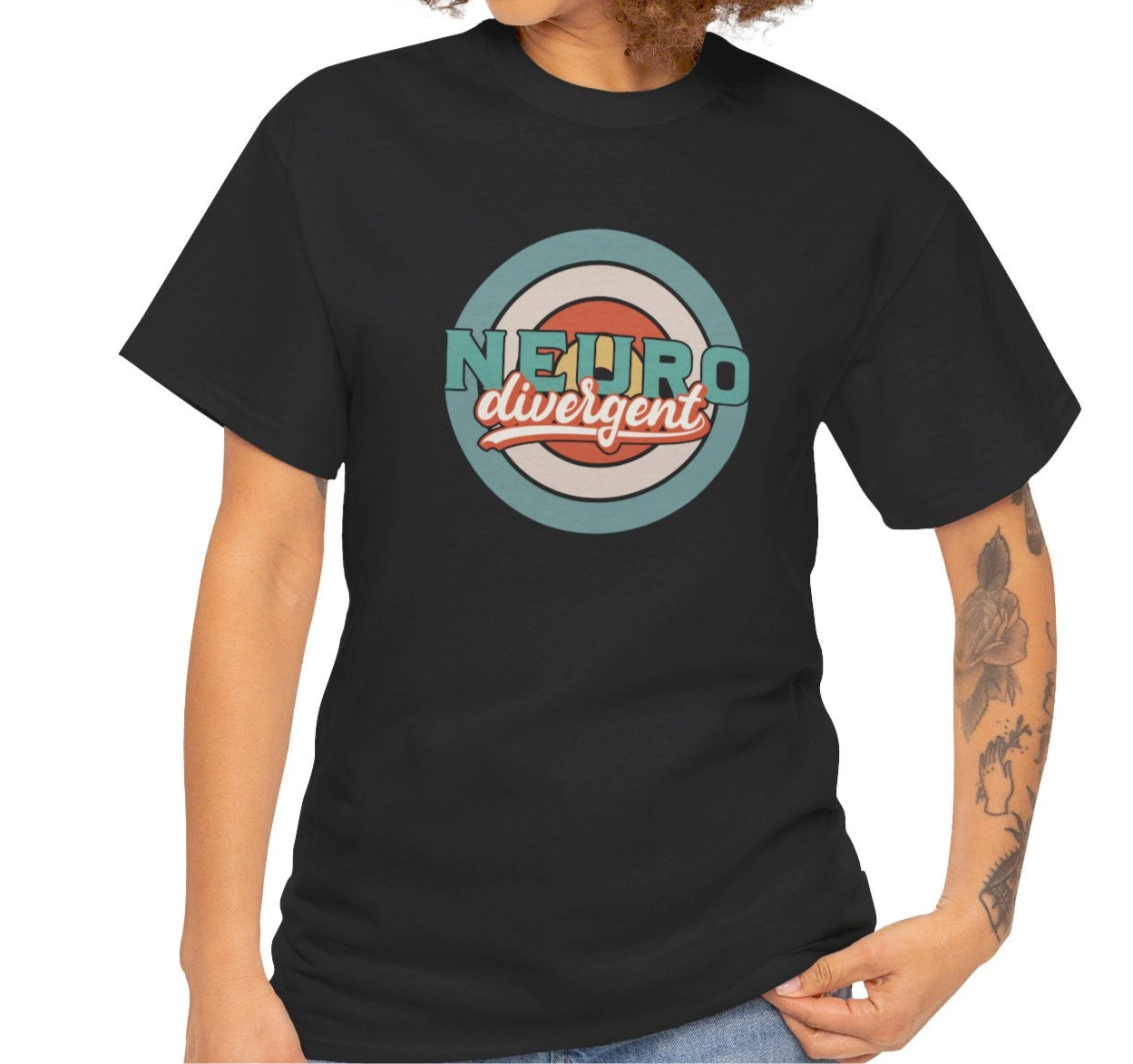 A person wearing a black T-shirt with a retro-style target graphic and the text "Neurodivergent" in bold lettering. Part of the Vivid Divergence Sensory Friendly Unisex Tees Range.