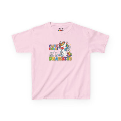 Front view of a pink "Cute, Smart, and a Little Bit Dramatic" unicorn kids T-shirt featuring a colorful unicorn graphic with playful text. Part of the Vivid Divergence Sensory Friendly Kids Shirts Range. The perfect T-shirt for sensory-sensitive kids and comes with a Sensory Satisfaction Promise.