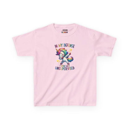 Front view of a pink "In My Defense, I Was Left Unsupervised" unicorn kids T-shirt featuring a playful, colorful unicorn graphic. Part of the Vivid Divergence Sensory Friendly Kids Shirts Range. The perfect T-shirt for sensory-sensitive kids and comes with a Sensory Satisfaction Promise.