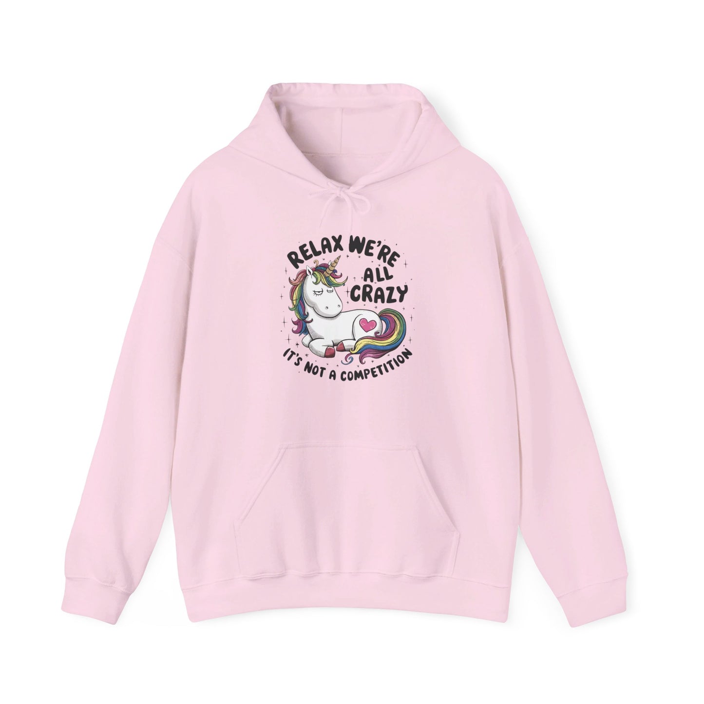 Front view of a pink hoodie featuring the text "Relax, We're All Crazy" and a cartoon illustration of a raccoon in a teacup. Part of the Vivid Divergence Sensory Friendly Unisex Hoodie Range.