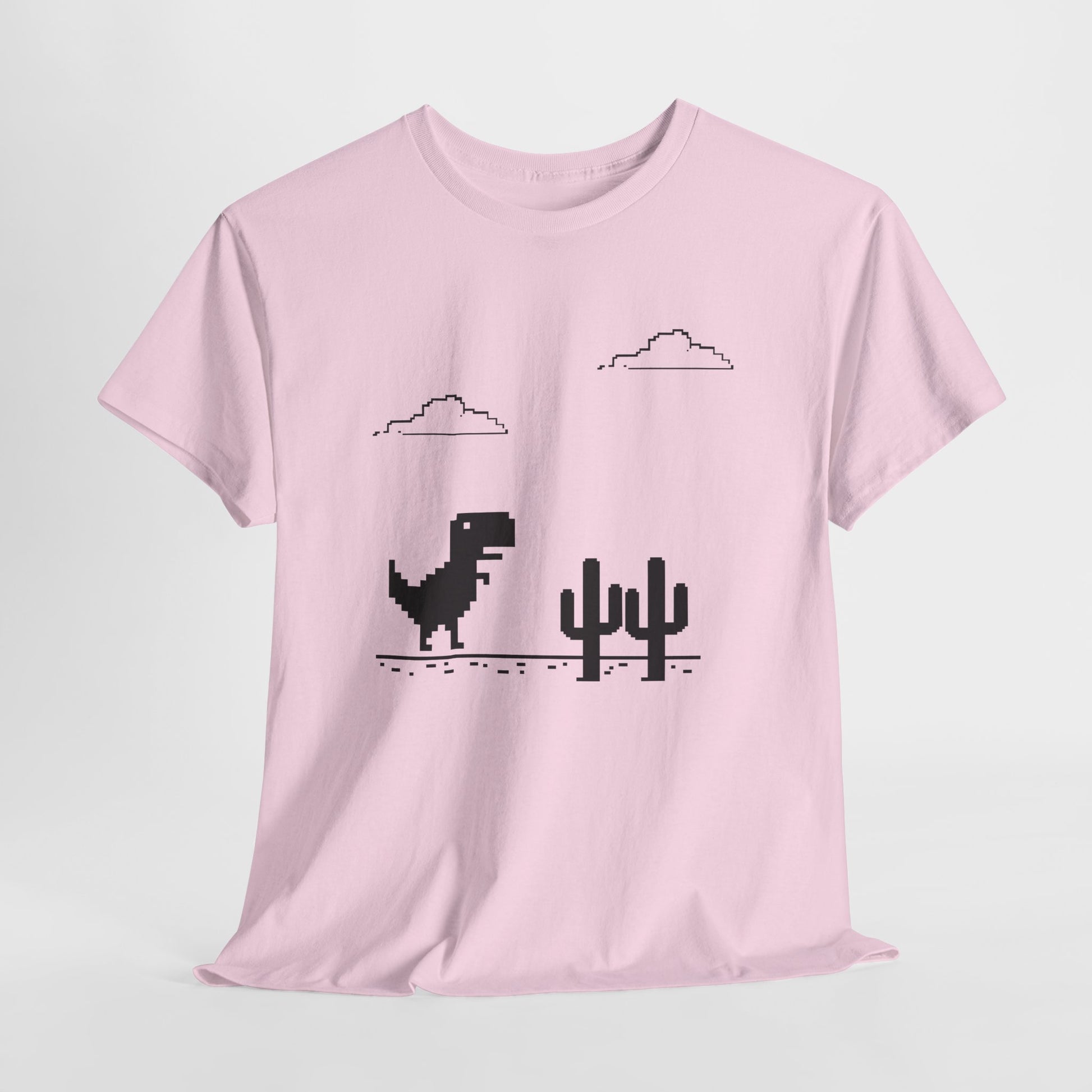 Hanging pink T-shirt featuring a minimalist pixel-style T-Rex Runner Dinosaur Game design with a T-Rex, cacti, and clouds. Part of the Vivid Divergence Sensory Friendly Unisex Tees Range.