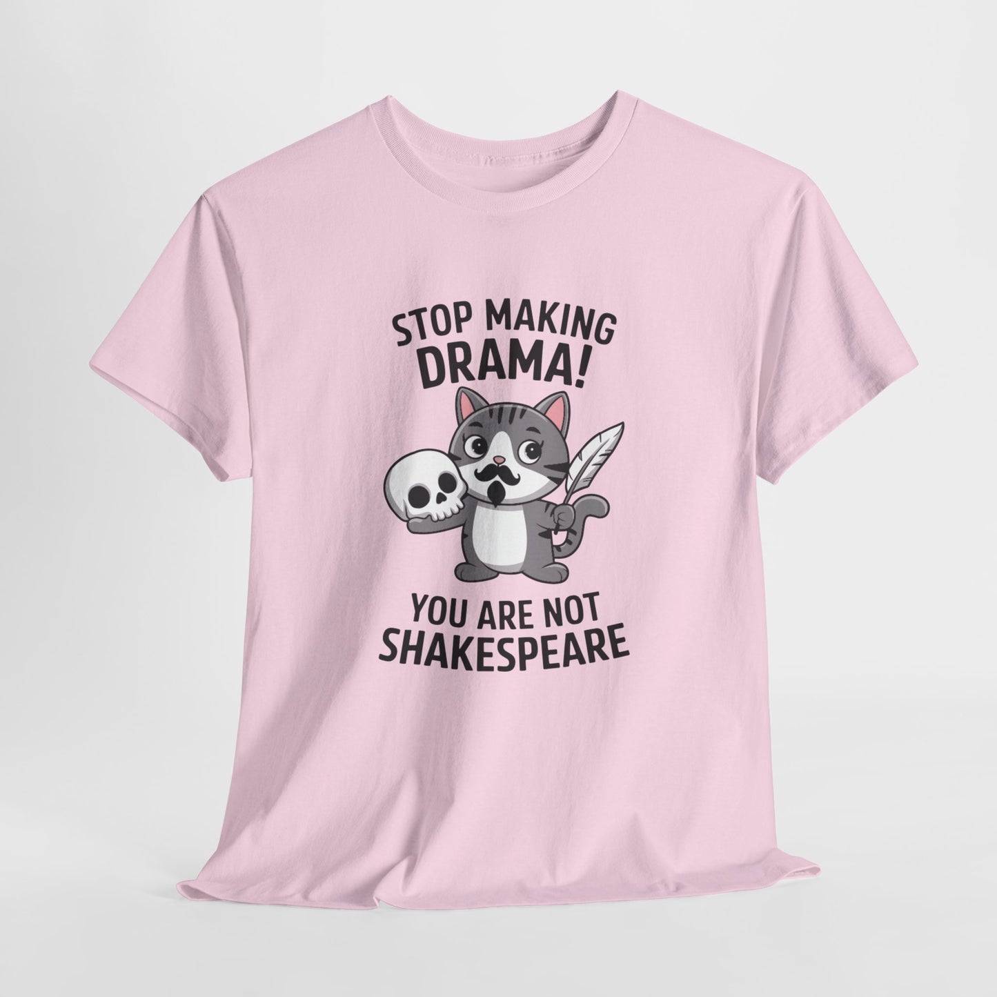 Hanging front view of a pink T-shirt featuring a cute cat holding a skull and text that reads "Stop Making Drama! You Are Not Shakespeare." Part of the Vivid Divergence Sensory Friendly Unisex Tees Range.