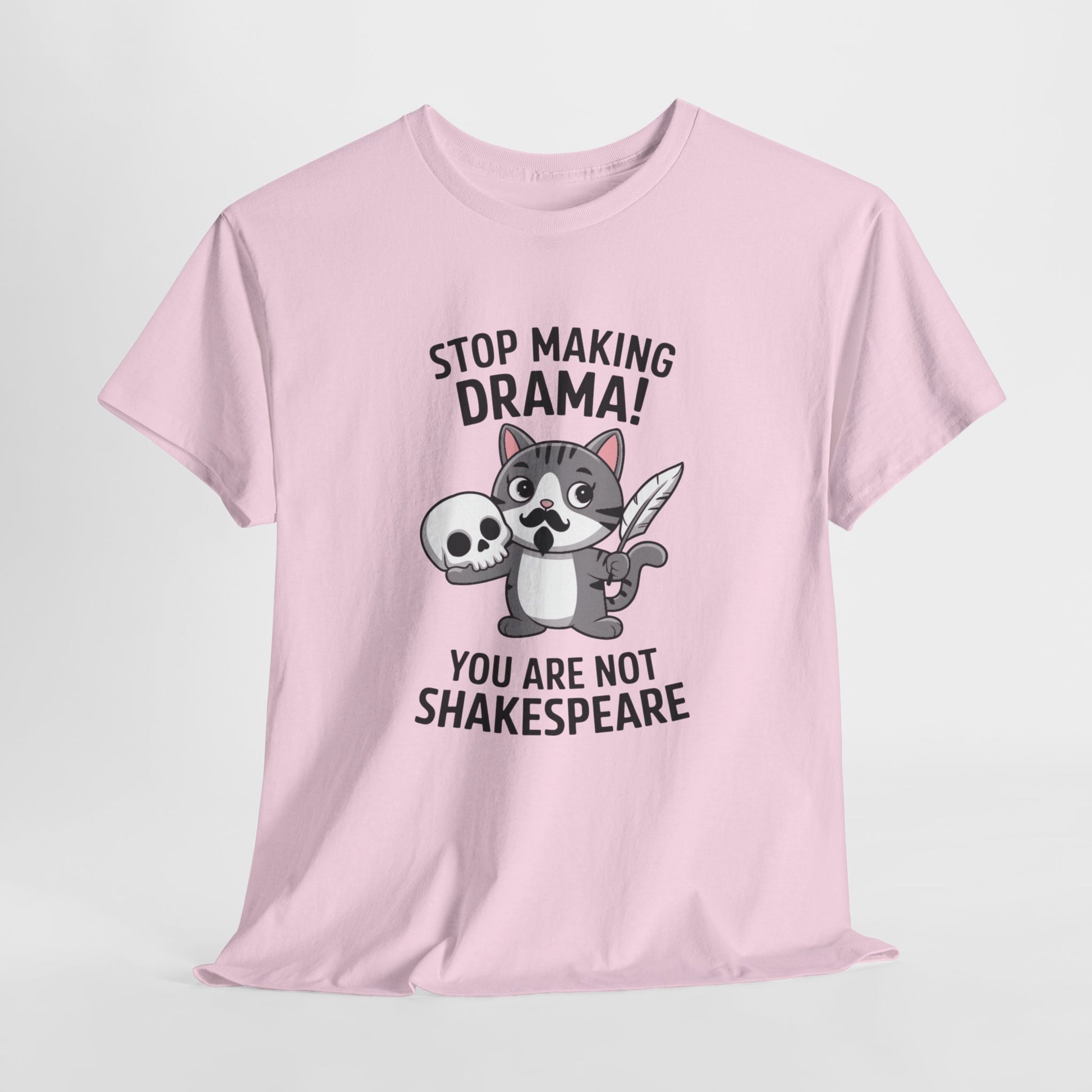 Hanging front view of a pink T-shirt featuring a cute cat holding a skull and text that reads "Stop Making Drama! You Are Not Shakespeare." Part of the Vivid Divergence Sensory Friendly Unisex Tees Range.