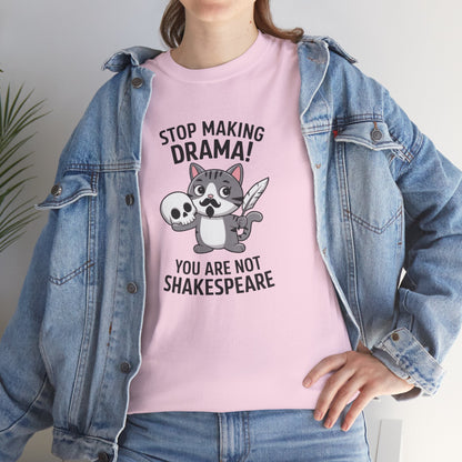 Modeled front view of a pink T-shirt featuring a cute cat holding a skull and text that reads "Stop Making Drama! You Are Not Shakespeare." Part of the Vivid Divergence Sensory Friendly Unisex Tees Range.
