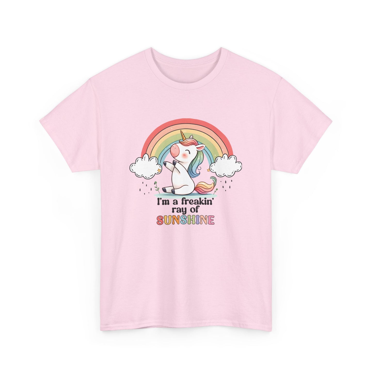 Front view of a pink T-shirt featuring a rainbow and unicorn graphic with the text "I'm A Freakin Ray Of Sunshine." Part of the Vivid Divergence Sensory Friendly Unisex Tees Range.