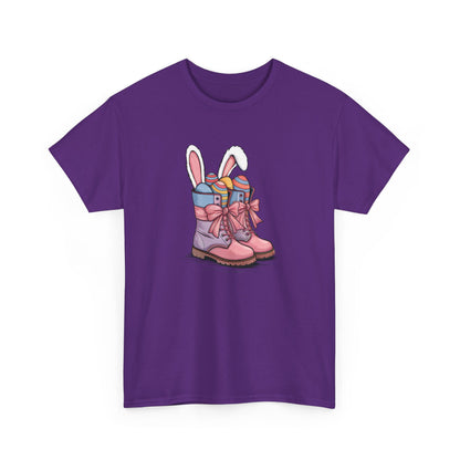 Purple Easter T-shirt showcasing cowgirl boots filled with Easter eggs and bunny ears, a stylish and trendy holiday choice. Hop into the season in style and shop Easter shirts online today! 