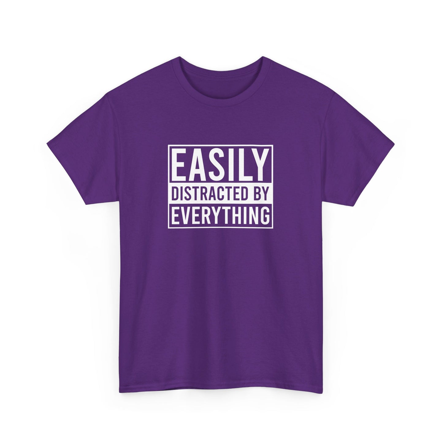 Front view of a purple T-shirt with the text "Easily Distracted by Everything" in bold white letters. Part of the Vivid Divergence Sensory Friendly Unisex Tees Range.