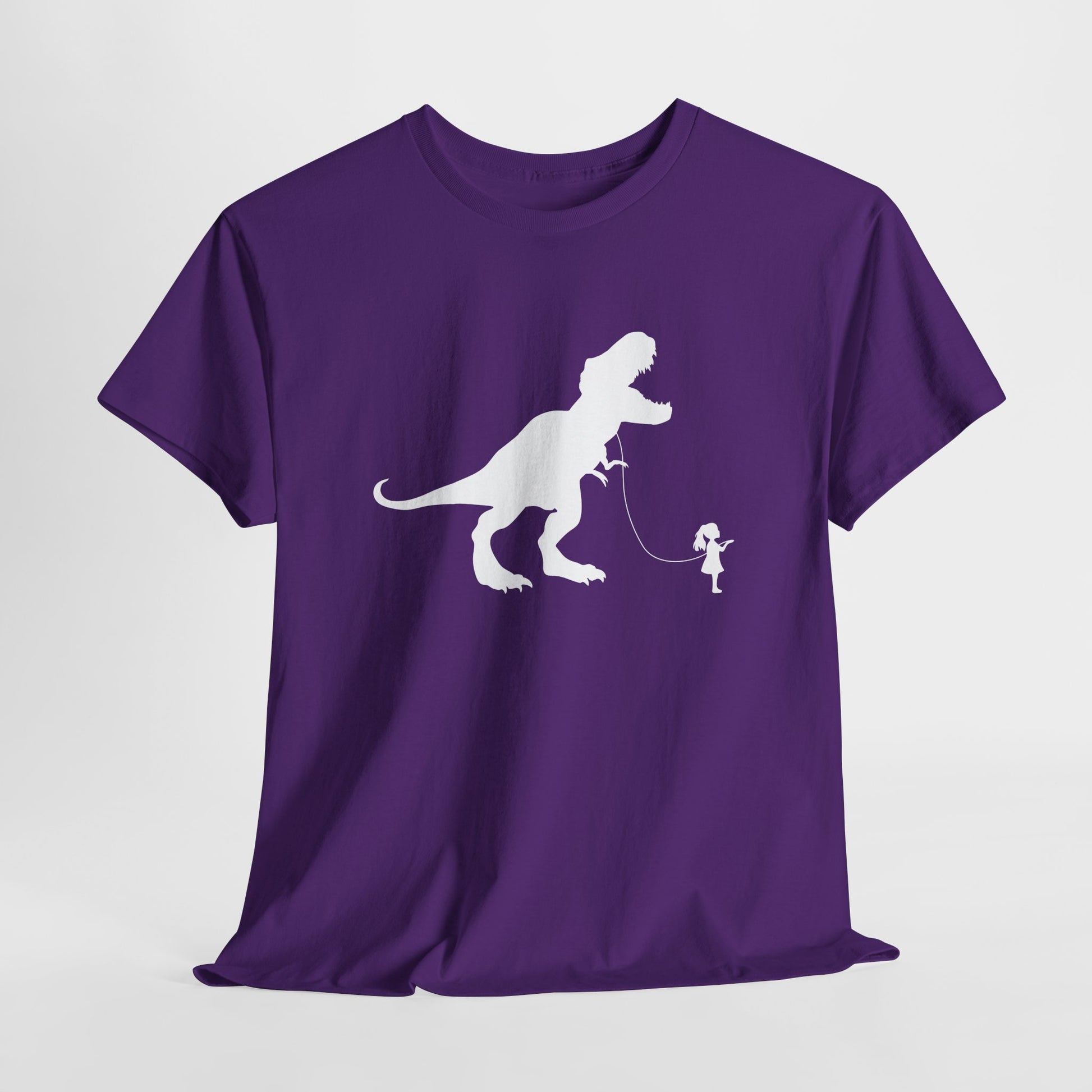 Hanging purple T-shirt featuring a white silhouette of a girl walking a T-Rex on a leash. Part of the Vivid Divergence Sensory Friendly Unisex Tees Range.