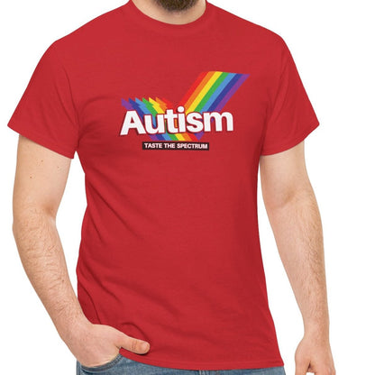 Side view of an red T-shirt worn by a person, featuring the phrase "Autism" in a Skittles-inspired design and a rainbow graphic. Part of the Vivid Divergence Sensory Friendly Unisex Tees Range. 