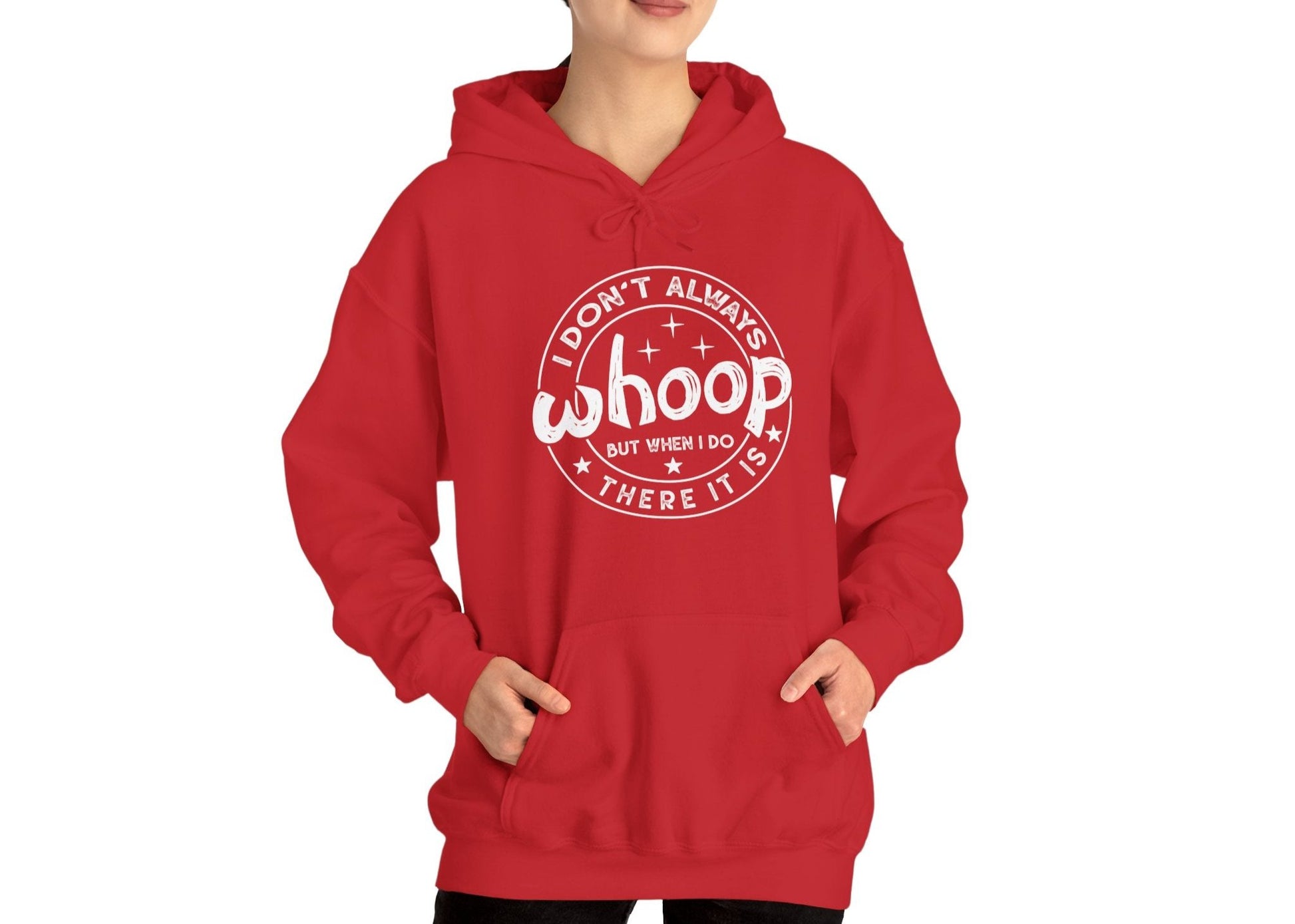 Model wearing a red hoodie featuring the text "I Don’t Always Whoop, But When I Do, There It Is" in a circular badge design. Part of the Vivid Divergence Sensory Friendly Unisex Hoodie Range.