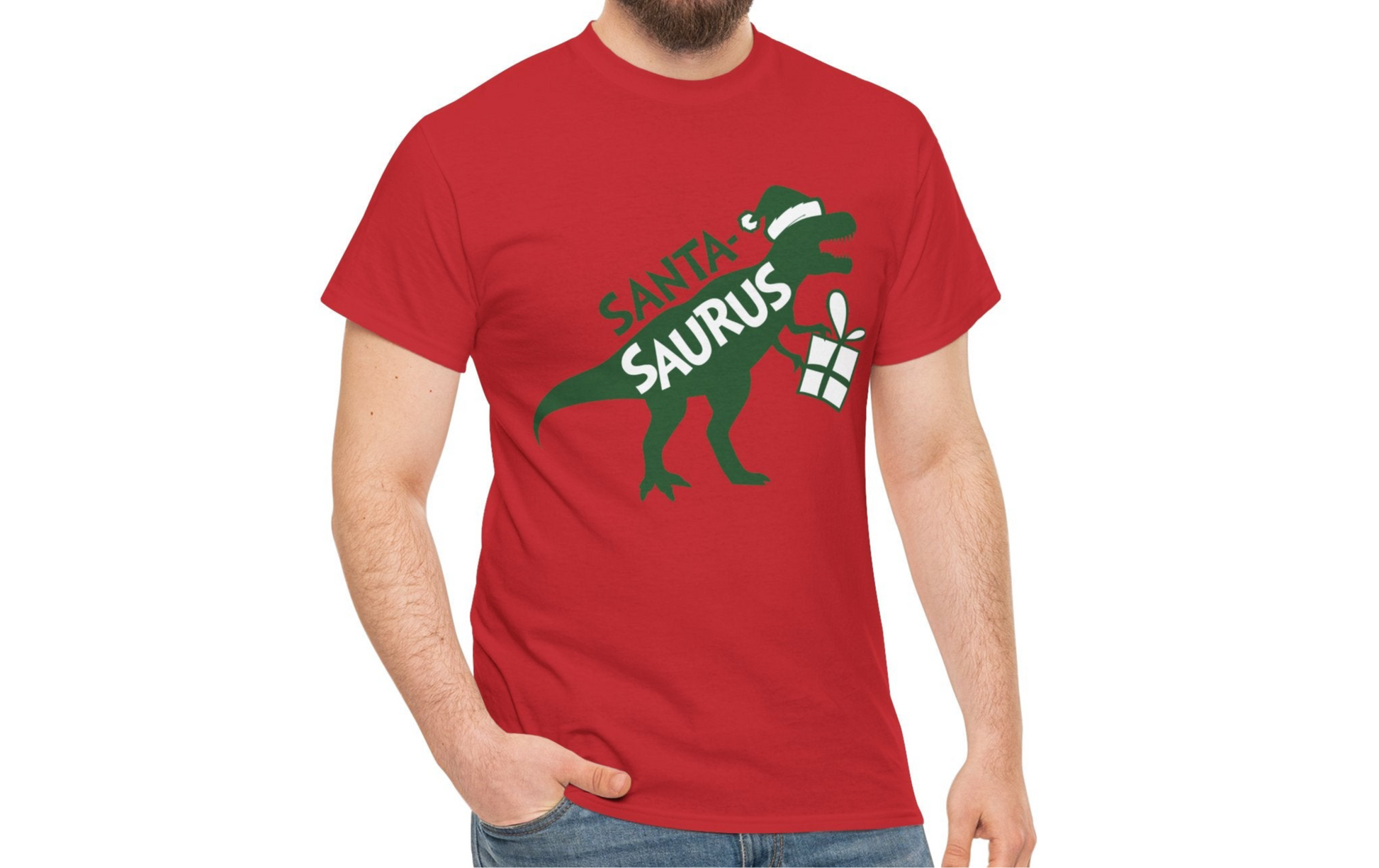 Model wearing a red T-shirt featuring a "Santa-Saurus Rex" design with a red dinosaur wearing a Santa hat and carrying a gift. Part of the Vivid Divergence Sensory Friendly Unisex Tees Range.