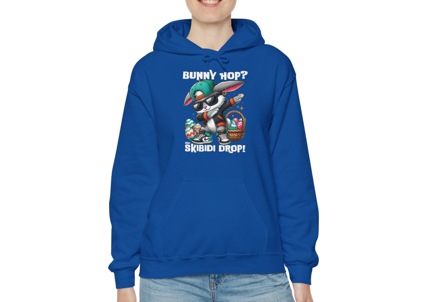 Woman in royal blue hoodie with Dabbing Bunny Hop and Skibidi Drop meme. Part of the Vivid Divergence Sensory Friendly Unisex Hoodies Range.
