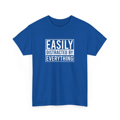 Front view of a royal blue T-shirt with the text "Easily Distracted by Everything" in bold white letters. Part of the Vivid Divergence Sensory Friendly Unisex Tees Range.