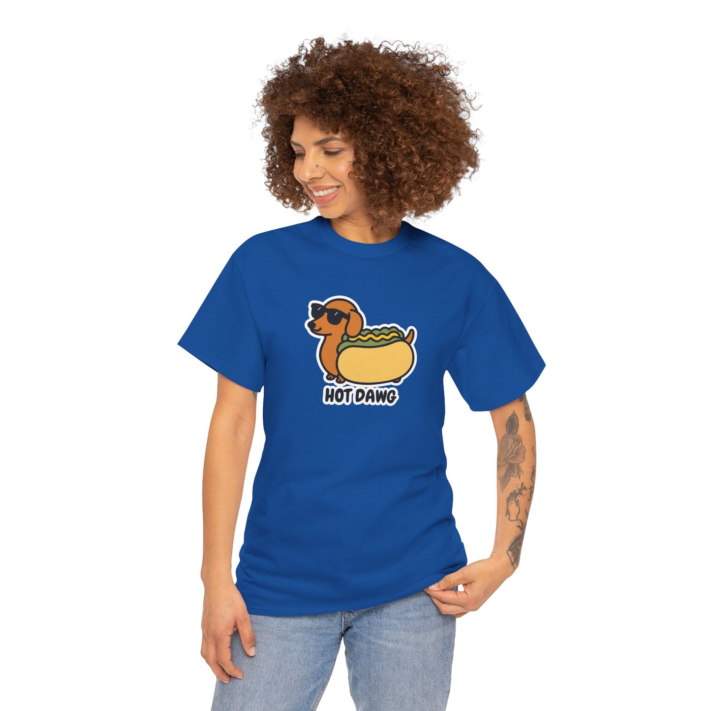 Model wearing a royal blue T-shirt featuring a "Hot Dawg" design with a cartoon dachshund inside a hot dog bun wearing sunglasses. Part of the Vivid Divergence Sensory Friendly Unisex Tees Range.