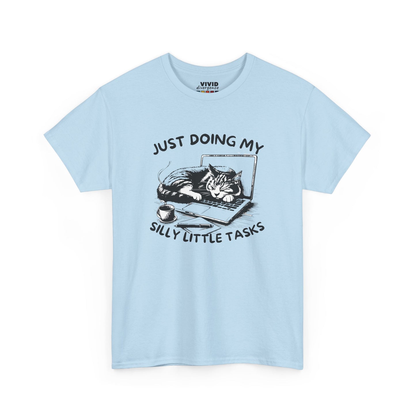 Front view of light blue T-shirt with sketch of a cat lying across a laptop and the phrase “Just Doing My Silly Little Tasks.” Emotionally shut down, physically curled up. Part of the Vivid Divergence Memewear Collection!
