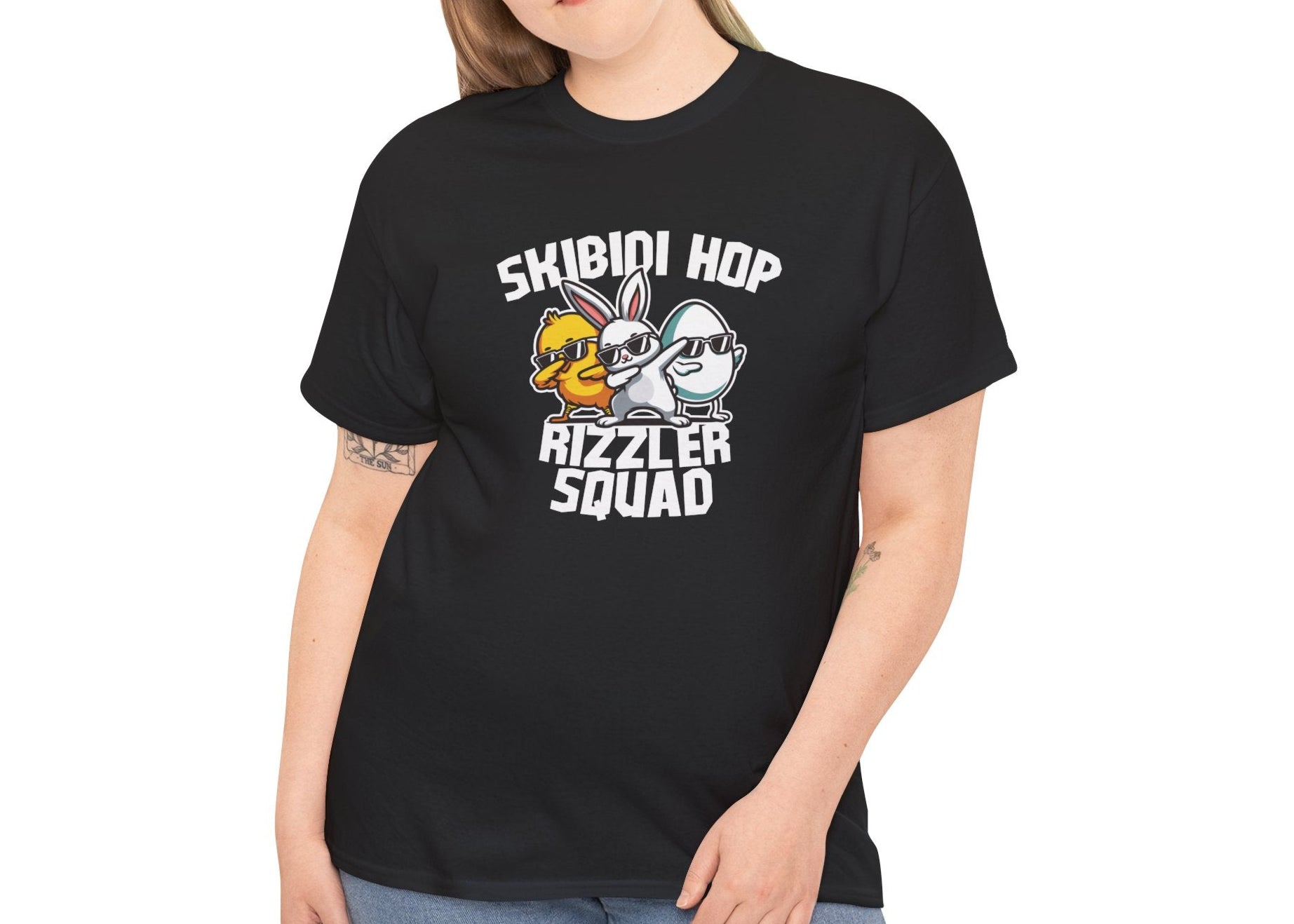 Modeled view of a black Skibidi Rizzler Squad Easter T-shirt featuring two stylish Easter characters flexing meme-worthy rizz energy. A trendy skibidi sigma tee for Easter. Part of the Vivid Divergence Sensory Friendly Unisex Tees Range.