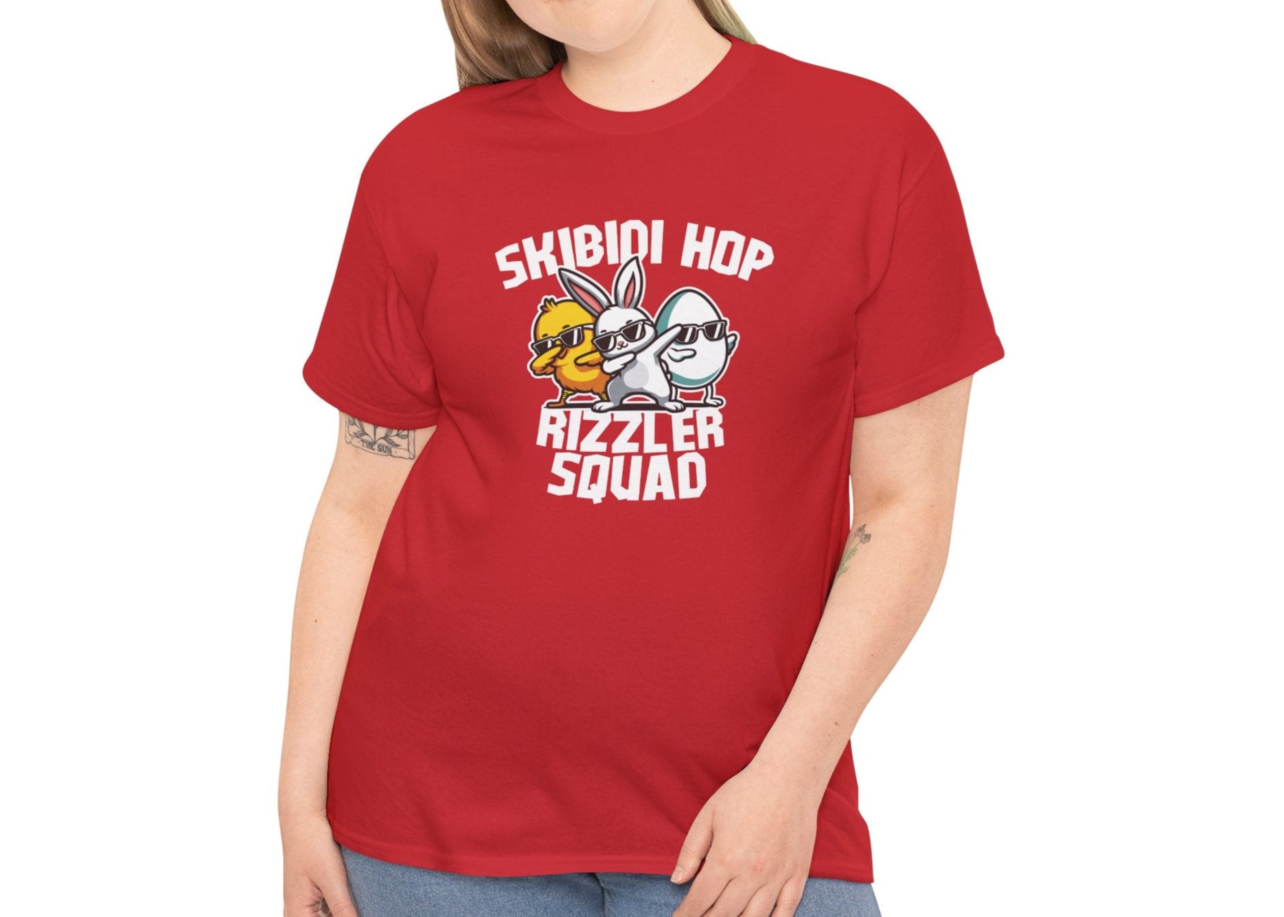 Modeled view of a red Skibidi Rizzler Squad Easter T-shirt with a meme-inspired design of a rizzed-up bunny and chick. A must-have Easter meme tee. Part of the Vivid Divergence Sensory Friendly Unisex Tees Range.