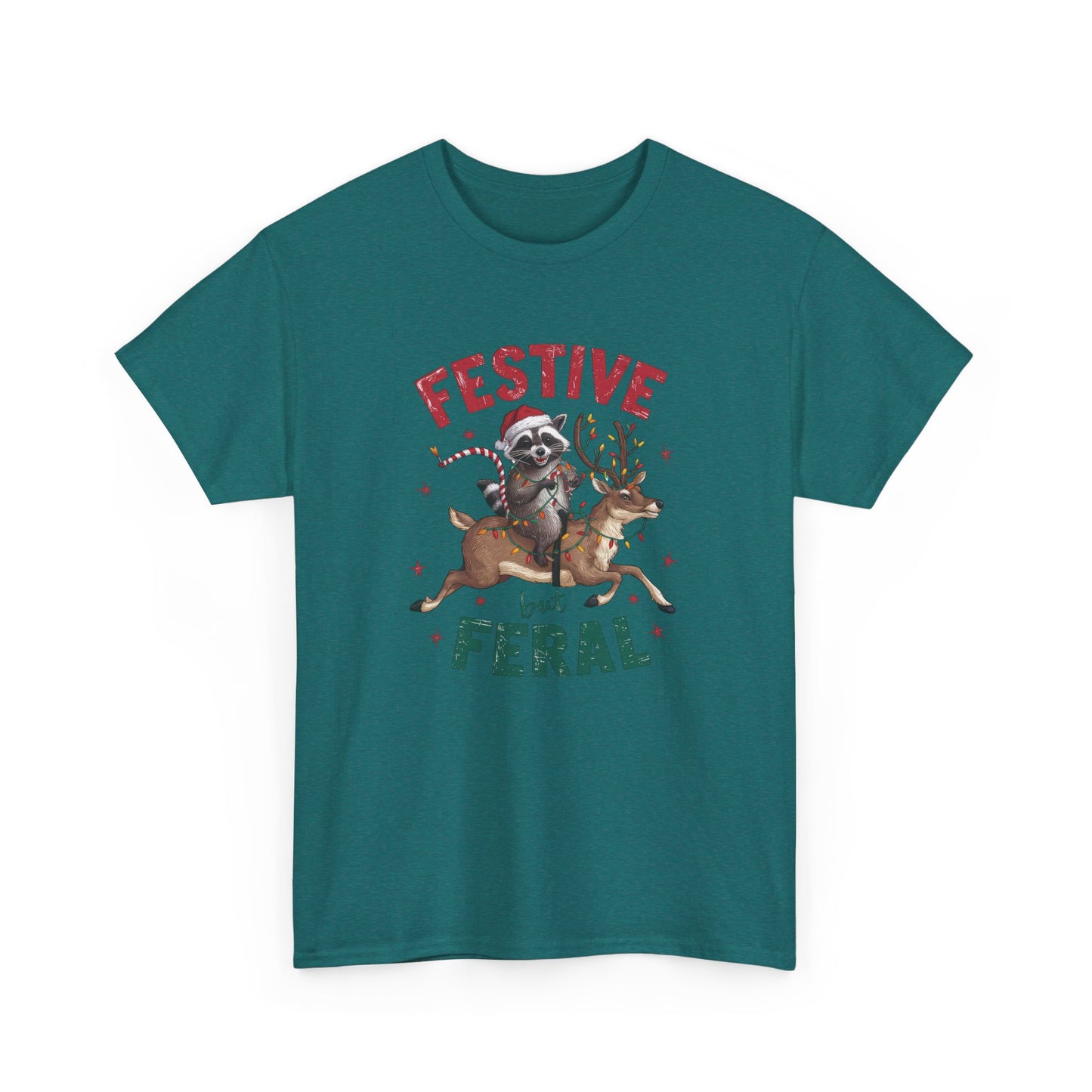 Front view of a teal T-shirt featuring a festive illustration of a raccoon (trash panda) holding Christmas lights and the text "Festive but Feral." Part of the Vivid Divergence Sensory Friendly Unisex Tees Range.