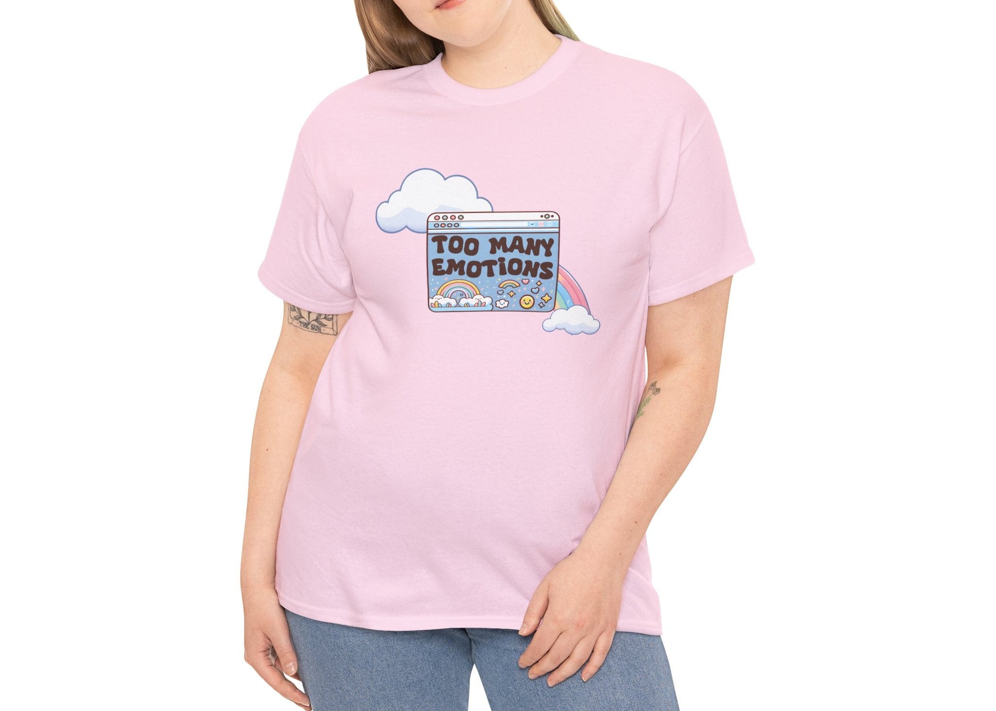 Modeled view of light pink T-shirt with retro rainbow-and-window design reading “Too Many Emotions.” Mentally buffering with style. Part of the Vivid Divergence Memewear Collection!