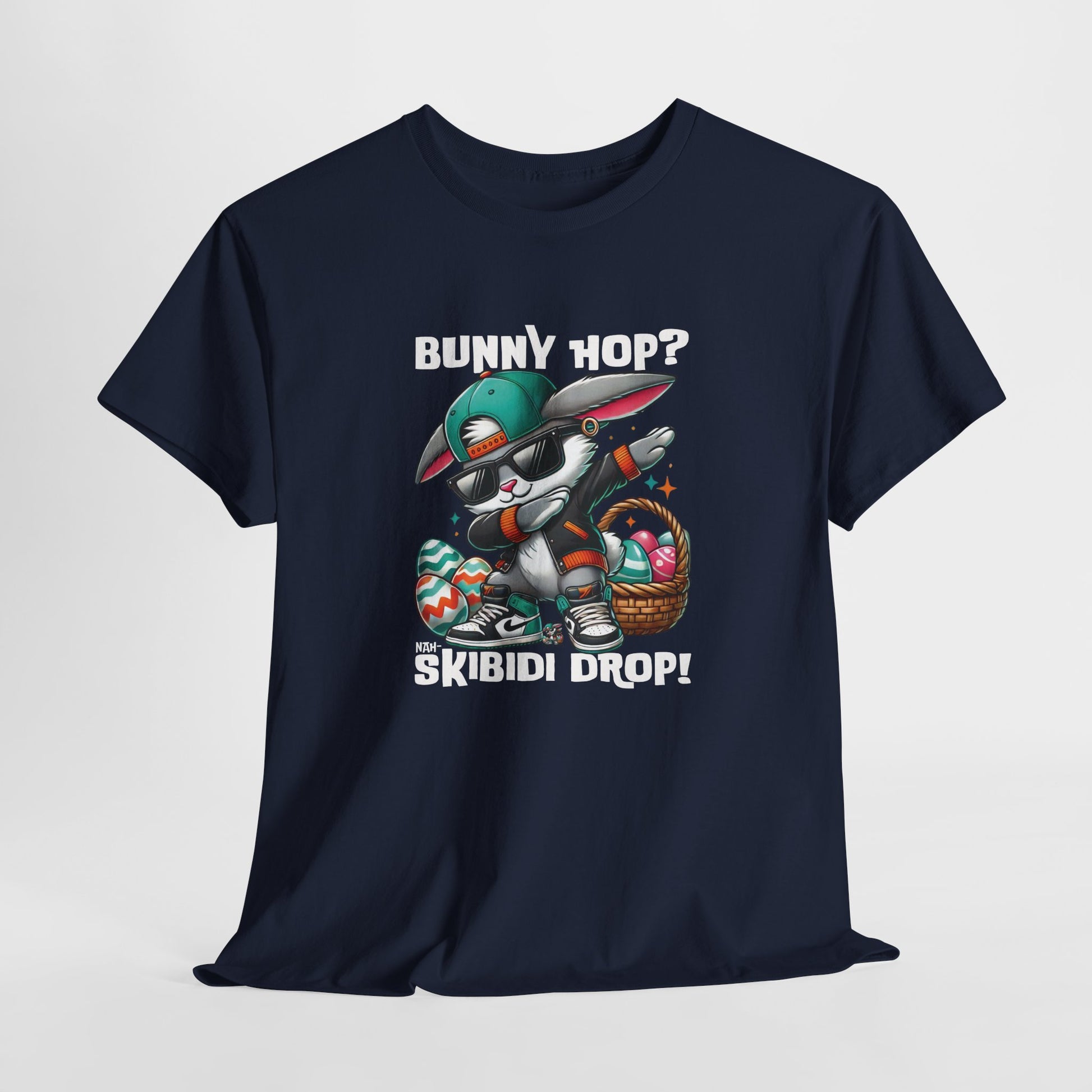Hanging view of a viral meme-inspired T-shirt in navy. Showcases a dabbing Easter bunny with the phrase "Bunny Hop? Nah, Skibidi Drop!" A stylish and playful shirt packed with skibidi sigma rizz vibes. Perfect for Easter fun. Part of the Vivid Divergence Sensory Friendly Unisex Tees Range.