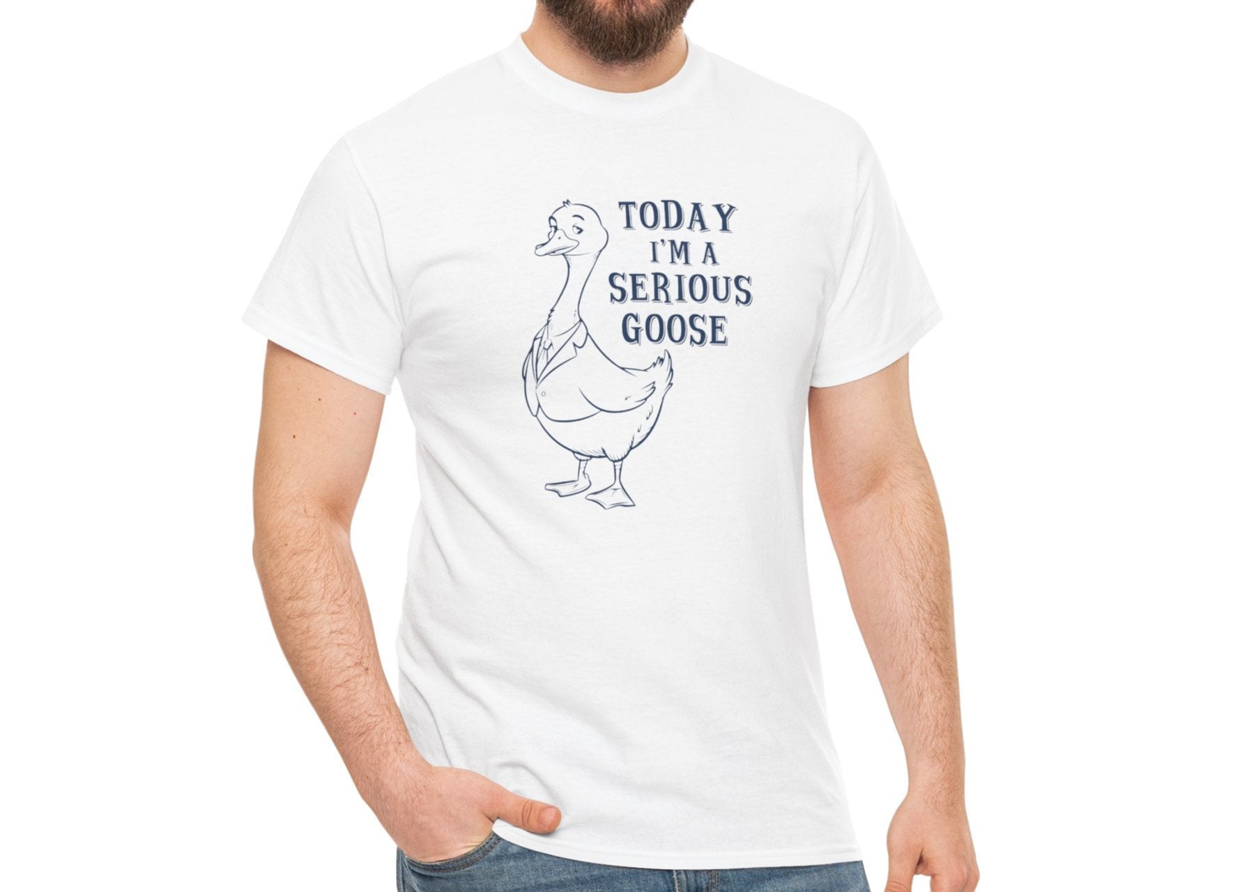 Model wearing a white T-shirt with "Today I'm A Serious Goose" in black text and a simple goose illustration. Part of the Vivid Divergence Sensory Friendly Unisex Tees Range.
