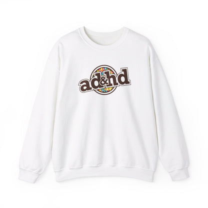 ront view of a white sweater jumper with an "ADHD" m&m brand parody design in brown and yellow tones. Part of the Vivid Divergence Sensory Friendly Unisex Sweater Jumper Range.