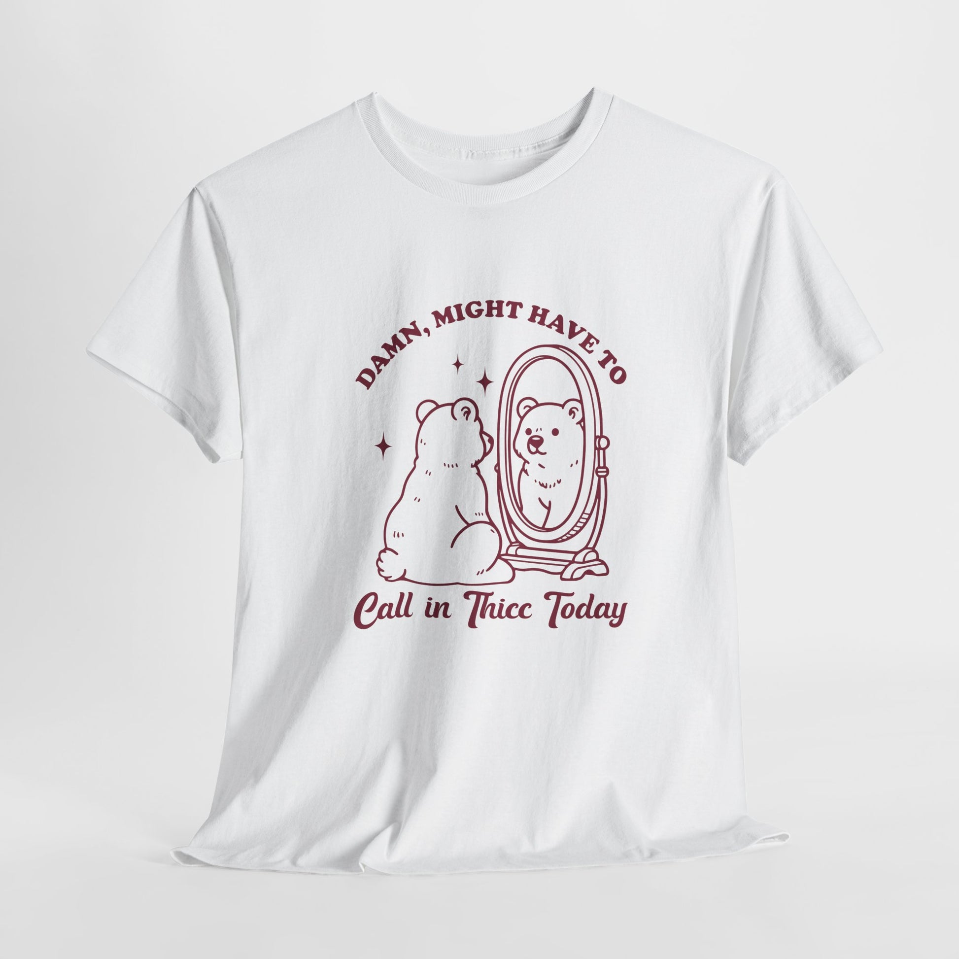 White T-shirt with a sitting bear in front of a mirror and "Damn, Might Have to Calling in Thicc Today" text in red, hanging view. Part of the Vivid Divergence Sensory Friendly Unisex Tees Range.