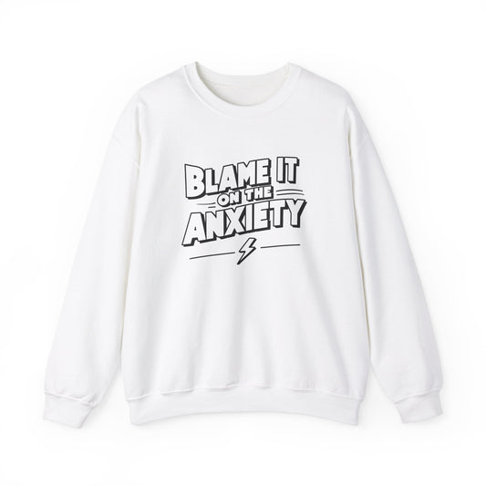 Front view of a white sweatshirt featuring bold text that reads "Blame It on the Anxiety" with an underline. Part of the Vivid Divergence Sensory Friendly Unisex Sweater Jumper Range.
