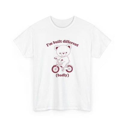 Front view of a white T-shirt featuring the "Built Different (Badly)" bear design. Part of the Vivid Divergence Sensory Friendly Unisex Tees Range.