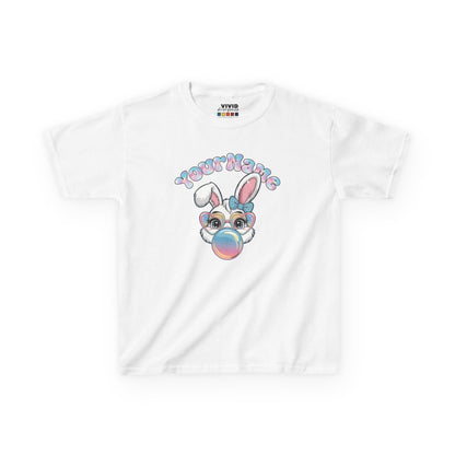 White kids' T-shirt featuring a bunny blowing bubblegum, customizable with your child's name. Looking for the perfect Easter shirts for kids? Whether you’re shopping for Easter shirts for boys, Easter shirts for girls, or Easter shirts for toddlers, we’ve got festive and fun options for everyone! Hop into the season in style and shop Easter shirts online today!