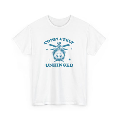 Front view of a white T-shirt featuring "Completely Unhinged" text with a cat hanging upside down from a ceiling fan in blue-tone design. Part of the Vivid Divergence Sensory Friendly Unisex Tees Range.