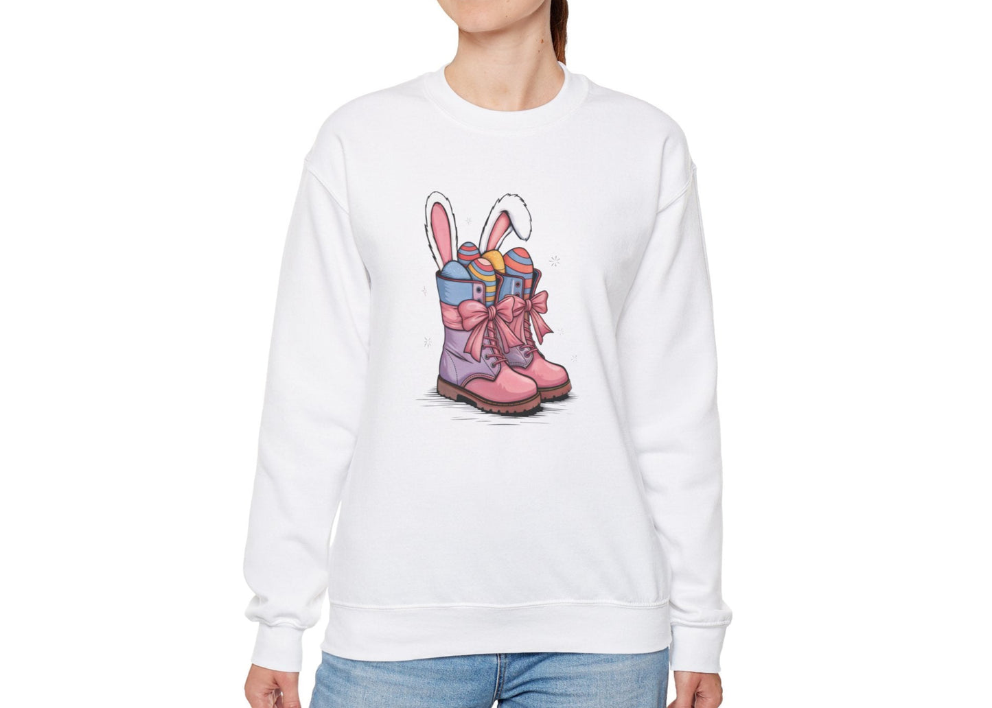 Woman wearing white sweater jumper with Easter-themed pink cowgirl boots design. Part of the Vivid Divergence Sensory Friendly Unisex Sweater Jumper Range.
