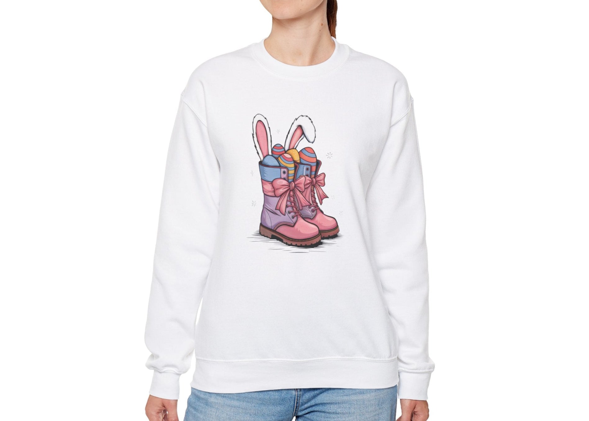 Woman wearing white sweater jumper with Easter-themed pink cowgirl boots design. Part of the Vivid Divergence Sensory Friendly Unisex Sweater Jumper Range.
