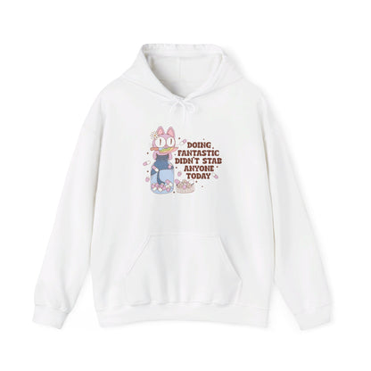Front view of a white hoodie featuring the text "Doing Fantastic, Didn’t Stab Anyone Today" and a cartoon illustration of a raccoon holding a knife. Part of the Vivid Divergence Sensory Friendly Unisex Hoodie Range.