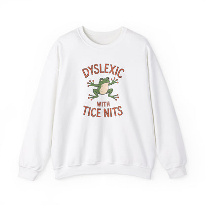Front view of a white sweatshirt featuring a cartoon frog and the text "Dyslexic with Tice Nits" in bold letters. Part of the Vivid Divergence Sensory Friendly Unisex Sweater Jumper Range.