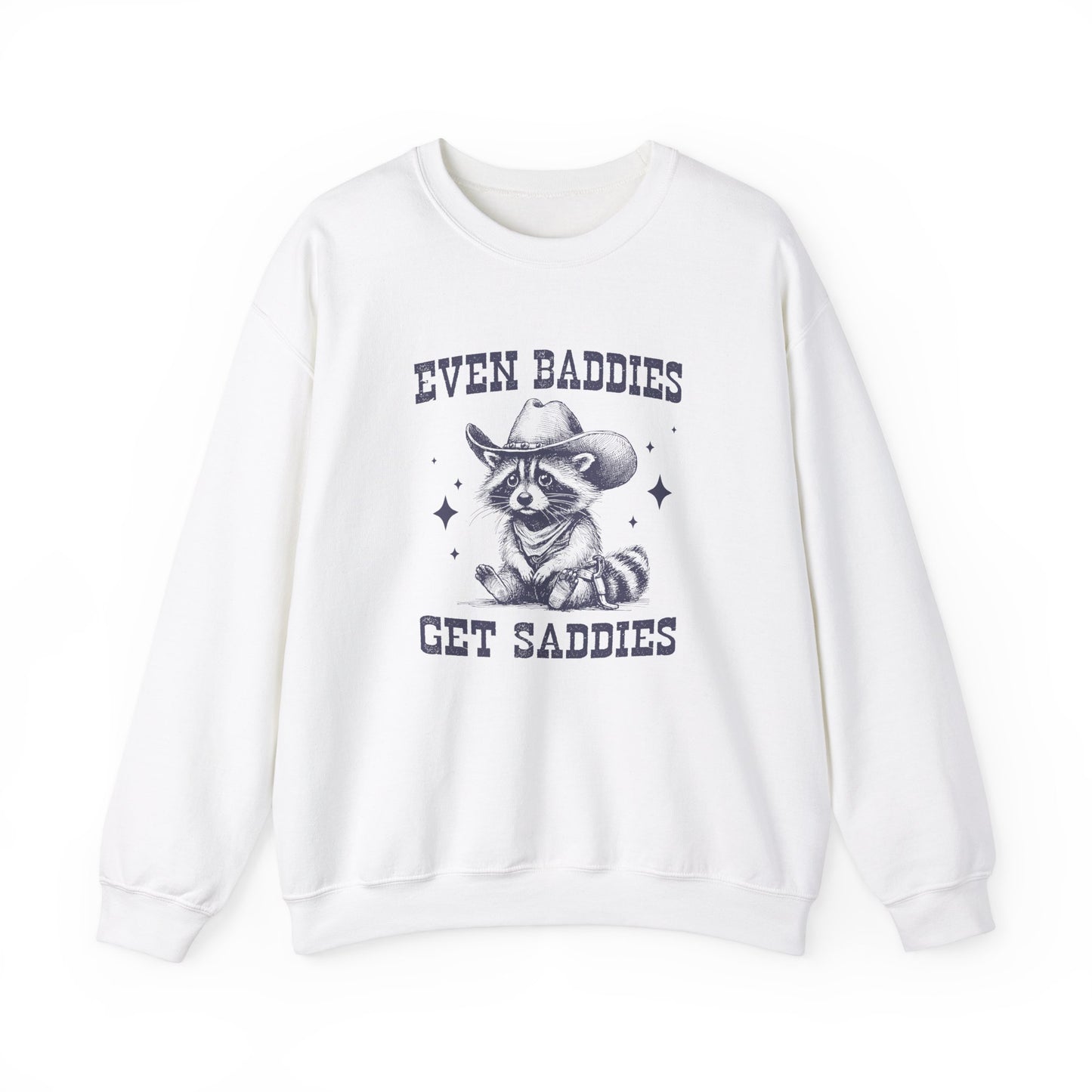 Front view of a white sweater jumper with the text "Even Baddies Get Saddies" and a cartoon raccoon illustration. Part of the Vivid Divergence Sensory Friendly Unisex Sweater Jumper Range.