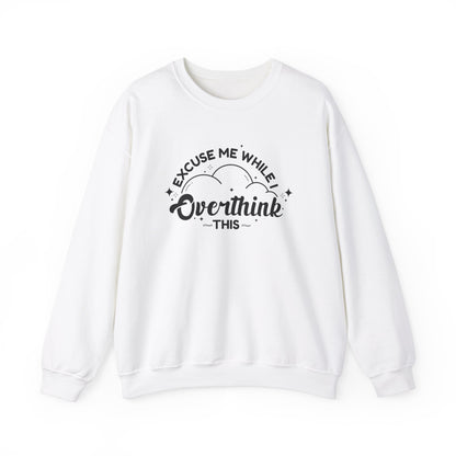 Front view of a white sweater jumper with the text "Excuse Me While I Overthink This" in black lettering. Part of the Vivid Divergence Sensory Friendly Unisex Sweater Jumper Range.