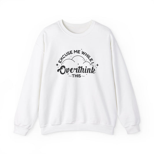 Front view of a white sweater jumper with the text "Excuse Me While I Overthink This" in black lettering. Part of the Vivid Divergence Sensory Friendly Unisex Sweater Jumper Range.